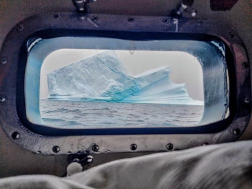 View of an Iceberg from a Vehicle Window