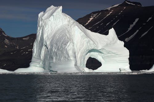 Iceberg near Mountain