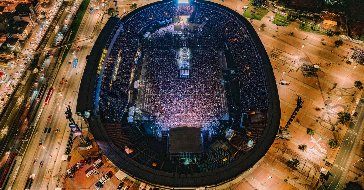 aerial view of Christ Embassy Loveworld Arena in Ho Volta Region with a large crowd outside