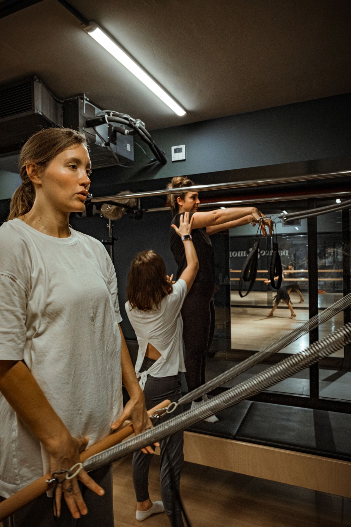 Group fitness session using resistance bands in an indoor gym