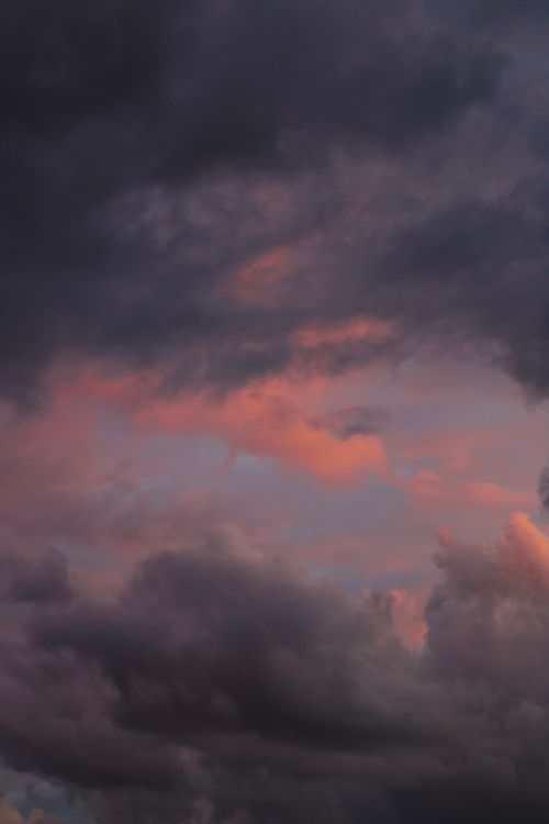 Free Captivating sunset sky with pink and blue clouds during golden hour. Stock Photo