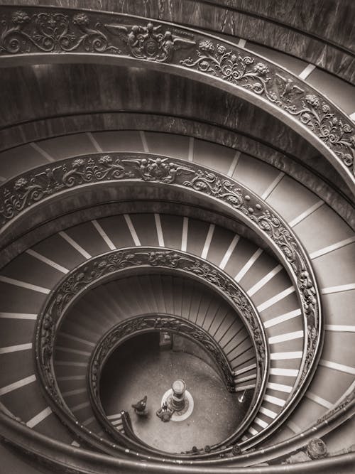 Sepia Toned Image of a Decorative Spiral Staircase