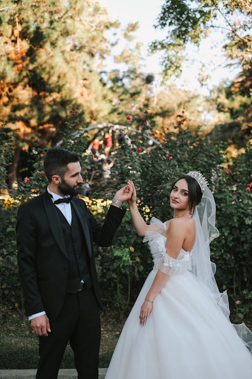 Newlyweds Holding Hands