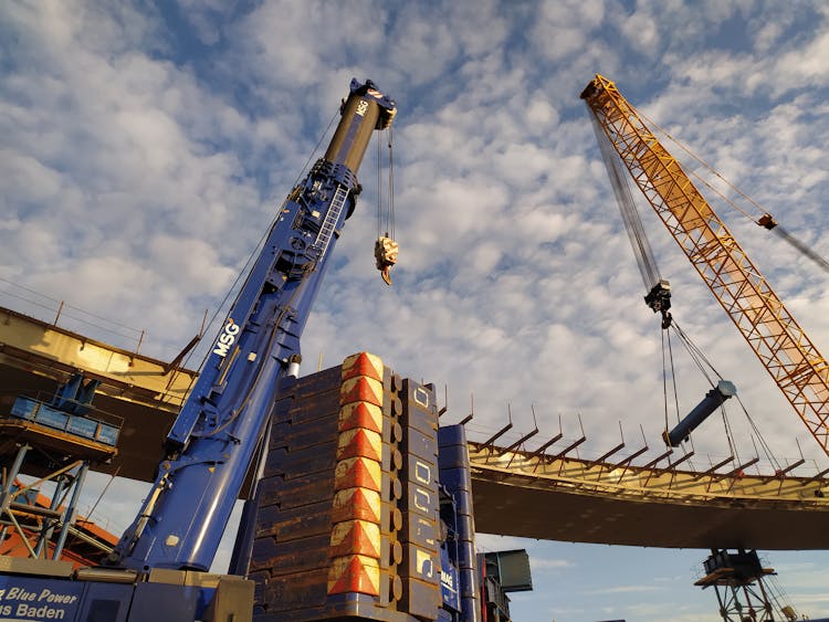 Industrial Cranes At A Construction Site