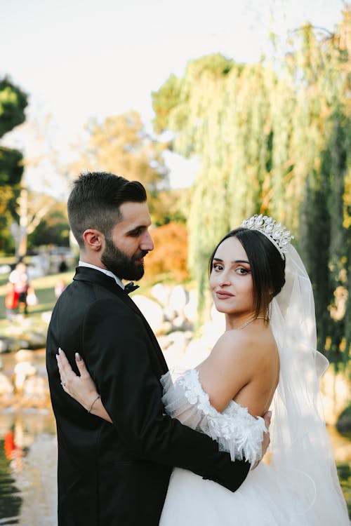 Newlyweds Posing and Hugging