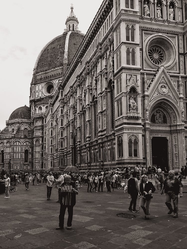 Tourists Around Cathedral In Black And White