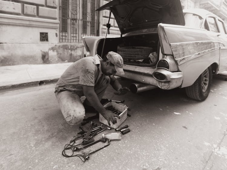 A Man  Checking His Tools