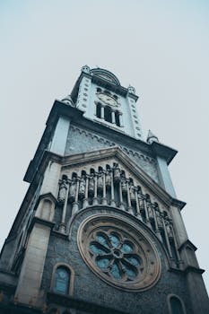 Low angle photograph showcasing intricate architectural details of a historic church in São Paulo.