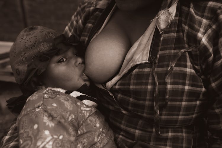  Photo Of Woman Breastfeeding A Baby