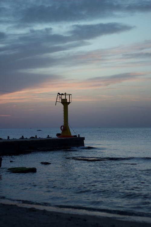 Photos gratuites de ciel nuageux, crépuscule, mer