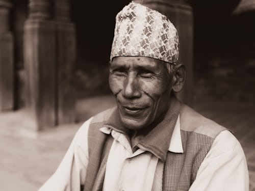 Senior Man Wearing a Karakul Hat 