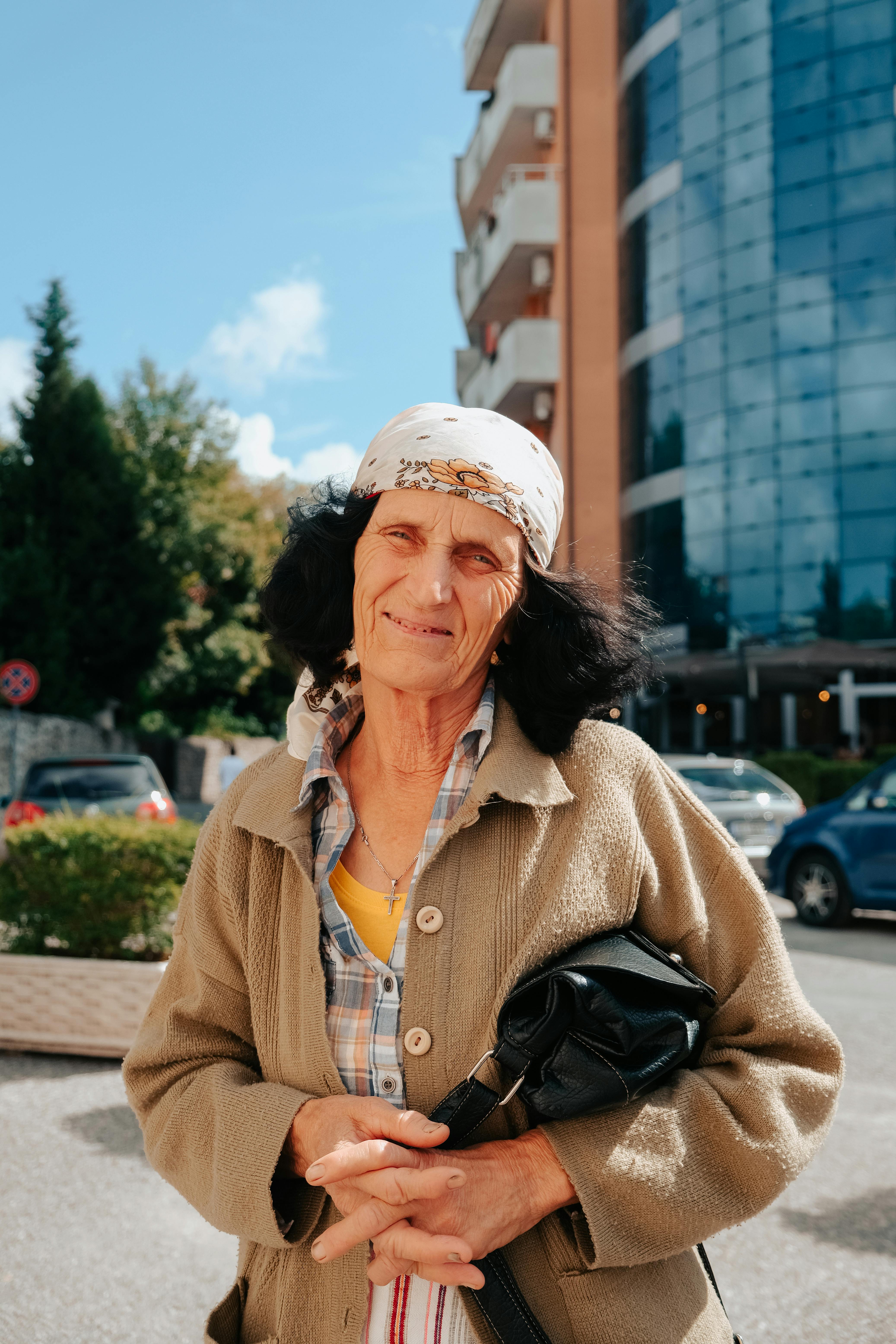 elderly woman wearing headscarf