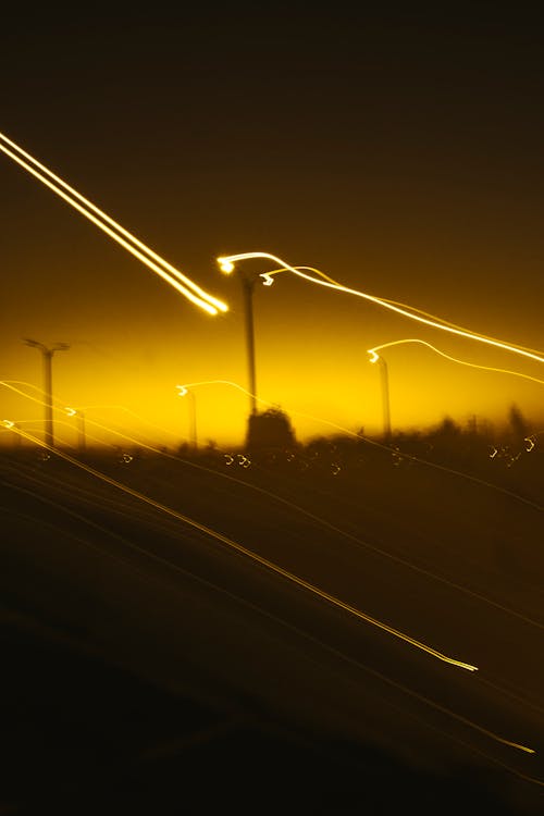 Photos gratuites de à contre-jour, airpods légers jaunes pro, ampoule jaune