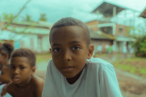 Boy in White Crew Neck Shirt