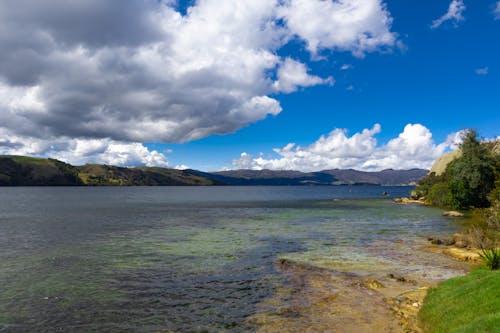 Lake Tota Under Blue Sky and White Clouds