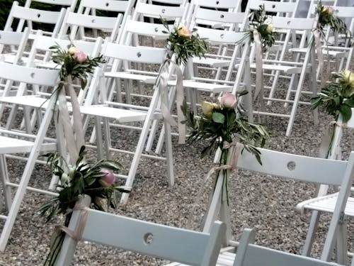Free stock photo of chairs, flower bouquets