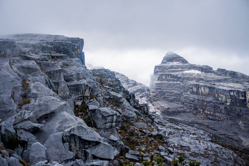 Free Explore the rugged rock formations of El Cocuy in this breathtaking overcast scene. Stock Photo