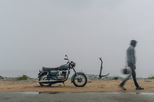 A Motorbike Parked on the Roadside