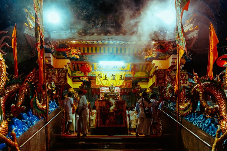People In Temple At Night 