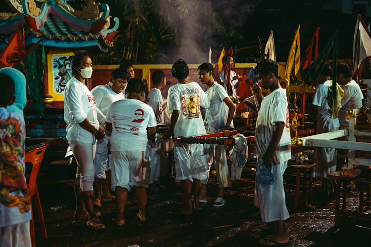 People In Temple At Night On Ceremony