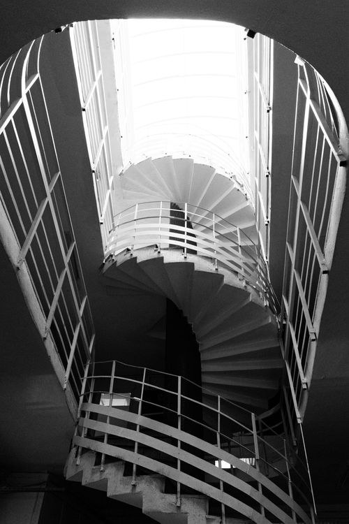 Free Striking architectural spiral staircase in monochrome perspective. Stock Photo