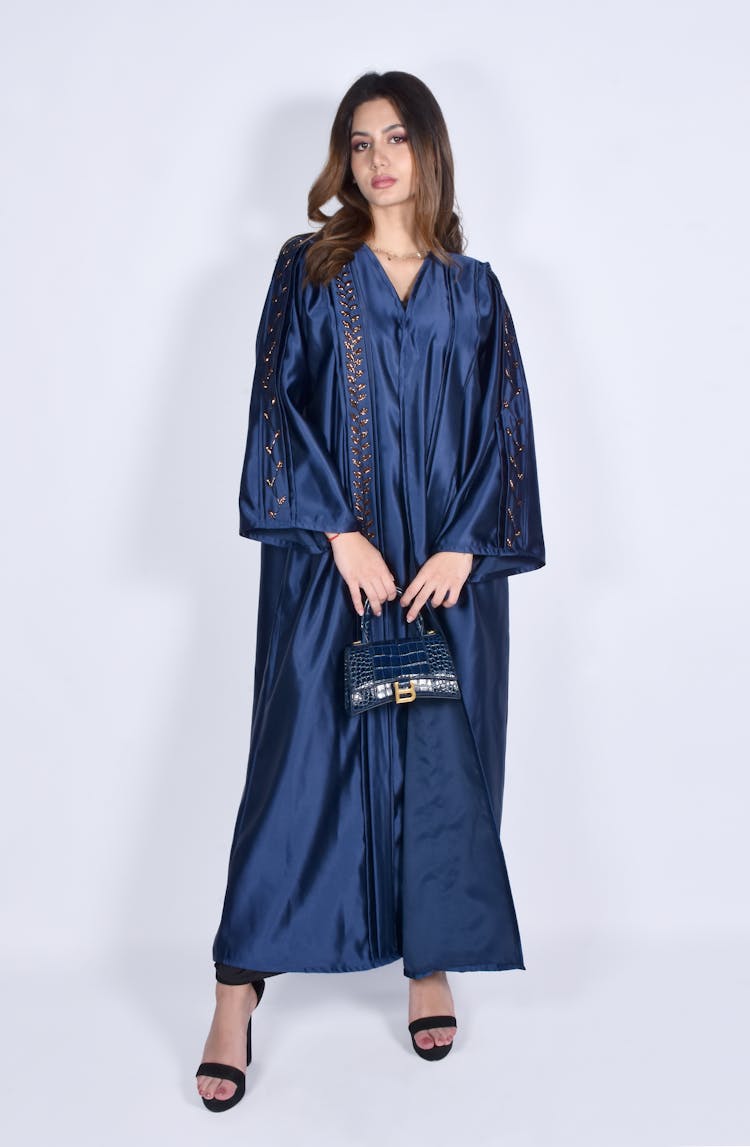 Woman Wearing A Blue Abaya