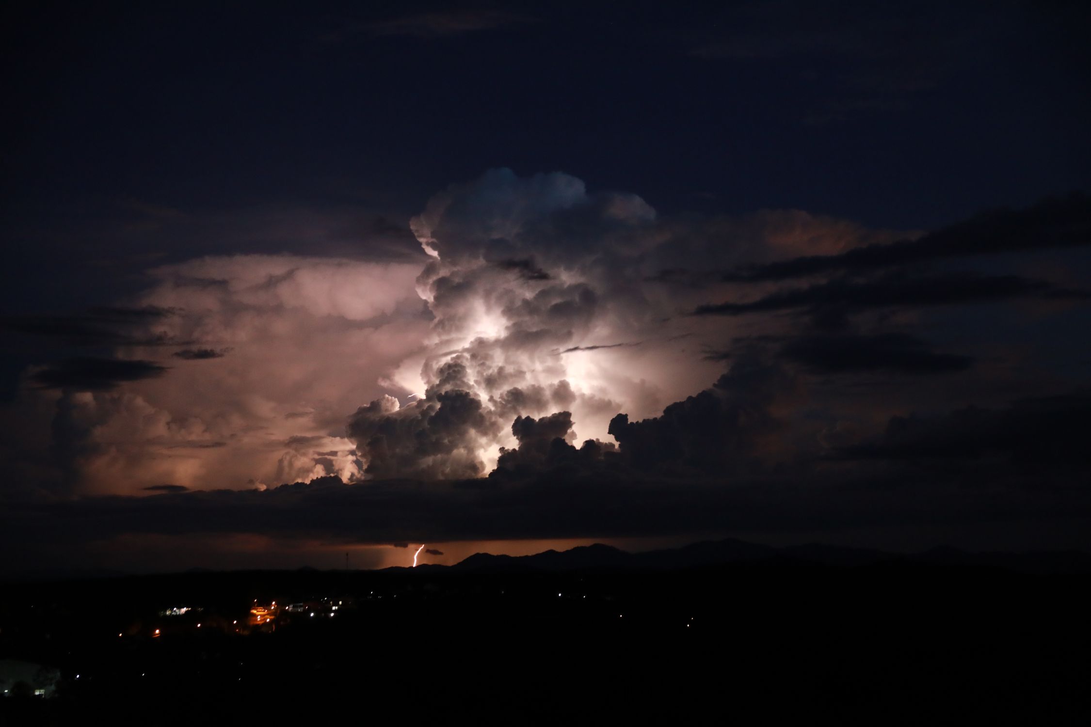 Dramatic Sky with Clouds and a Thunderstorm at Night · Free Stock Photo
