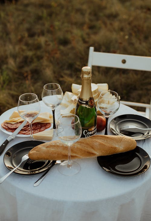 Champagne Bottle on Table Outdoors