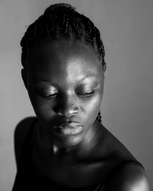 Free Elegant black and white portrait of an African woman with braided hair. Stock Photo