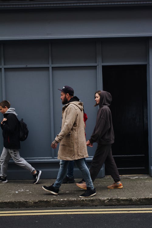 People on a Pavement on a Street 