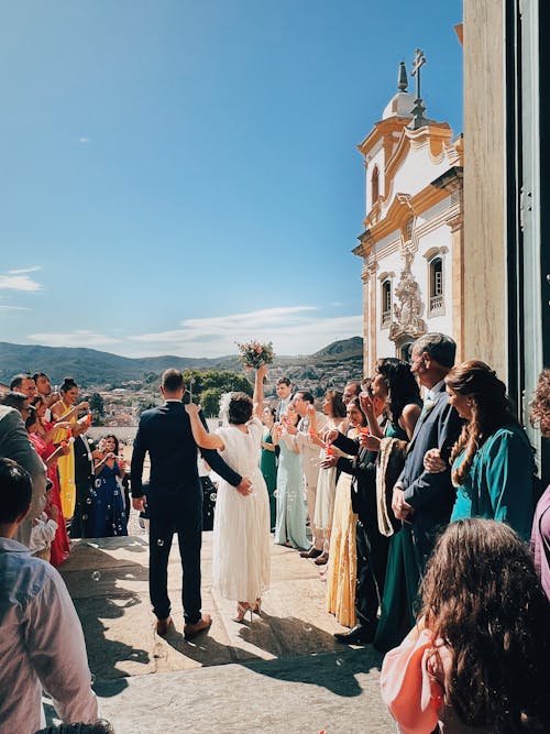 People Greeting the Newly Married Couple