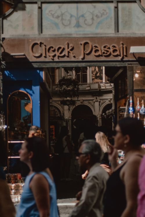 Free View of people walking in front of the historic Çiçek Pasajı in Istanbul, Turkey. Stock Photo