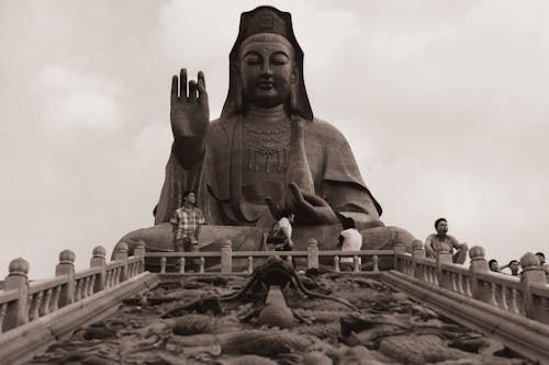 Stone Buddha Sculpture on Sky Background