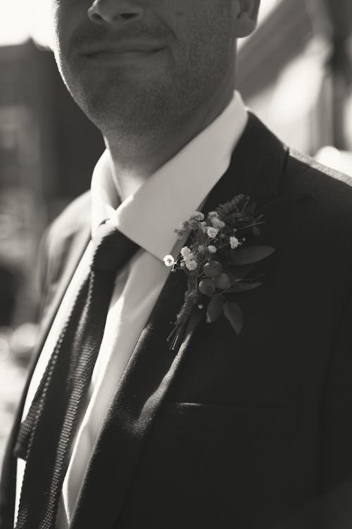 Close-up of a Groom in a Tuxedo with a Boutonniere