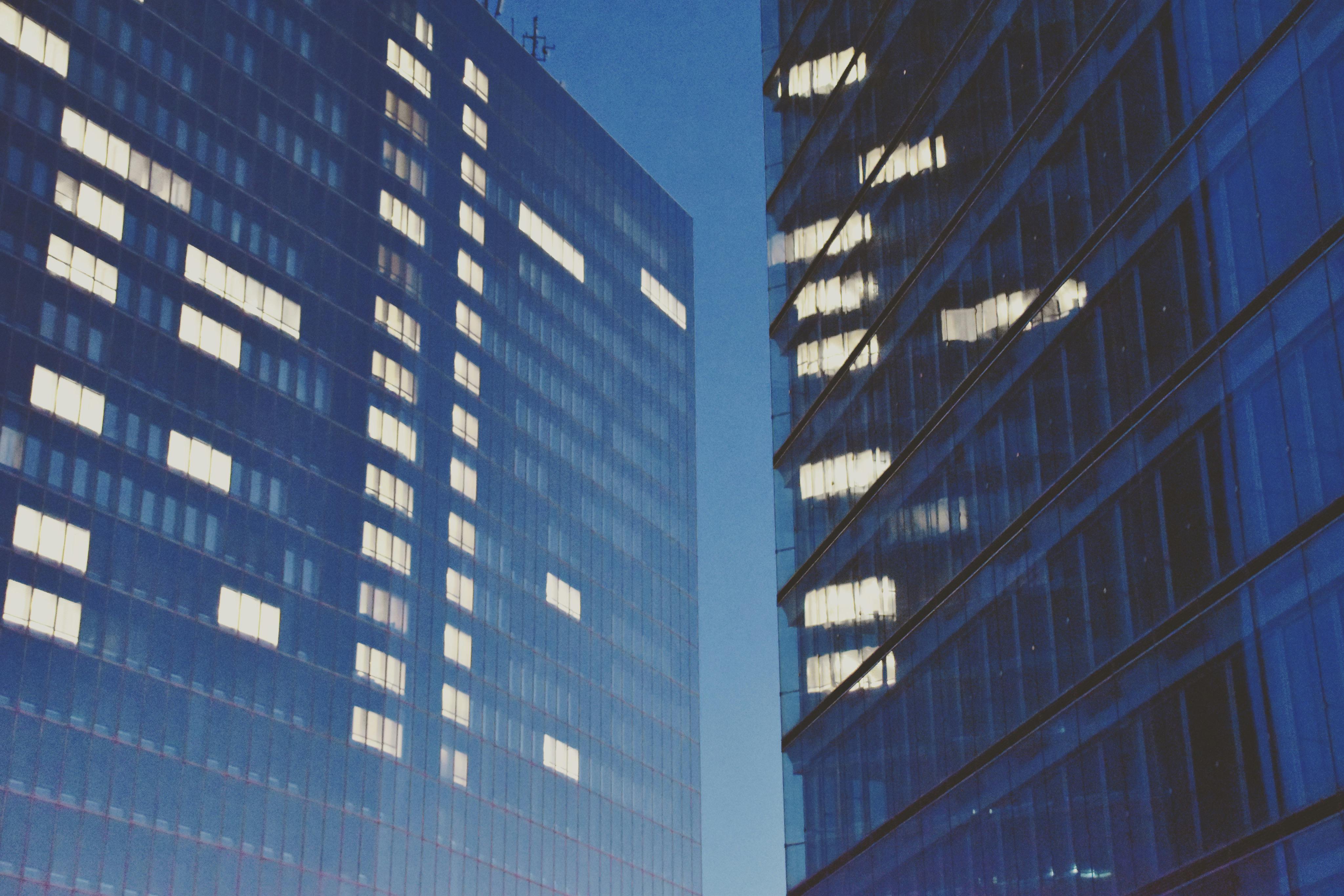 Luxembourg city skyline featuring modern skyscrapers at twilight.