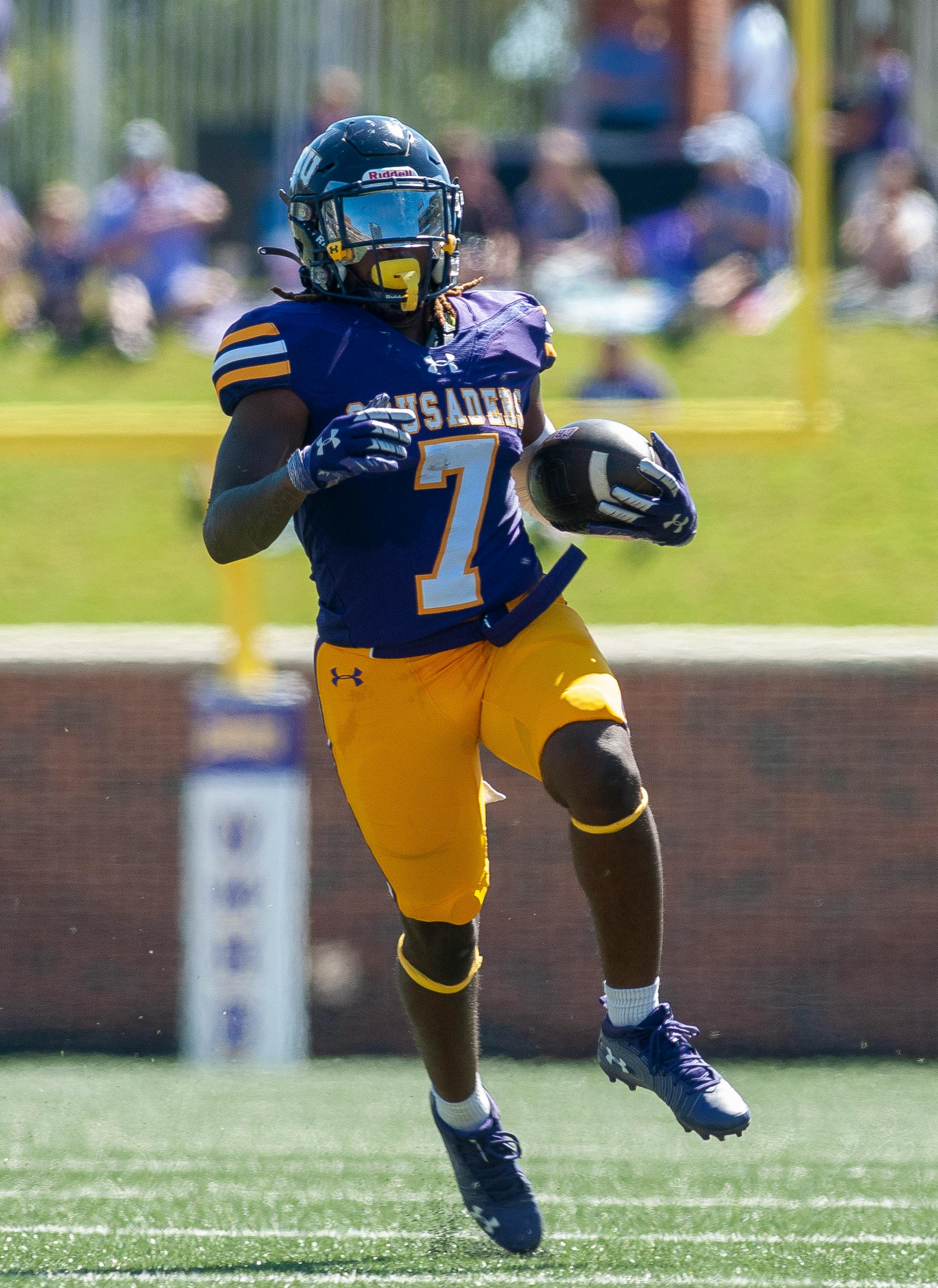 American Football Player in Blue and Yellow Jersey Shirt and Helmet · Free  Stock Photo