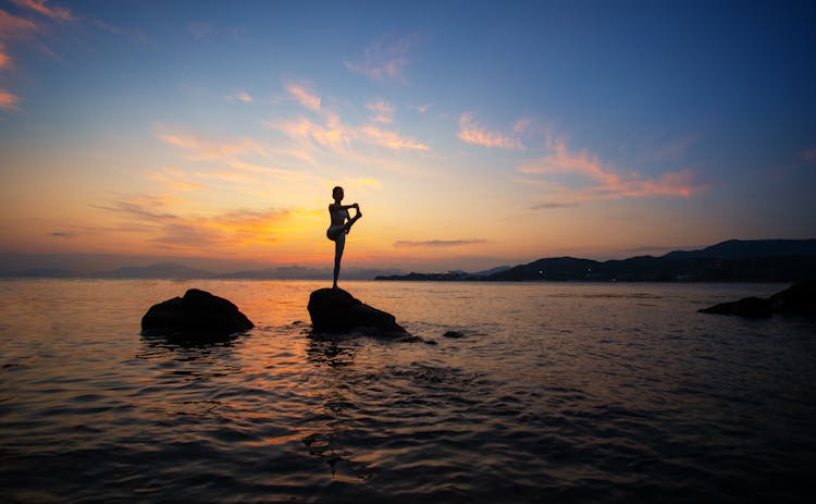 Silhouette Of Person Doing Workout 