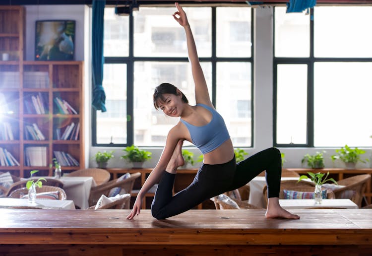 Woman Doing Yoga At Home 