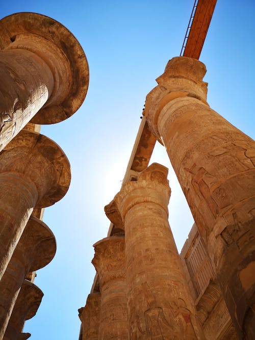 Ancient Columns Ruins on Blue Sky