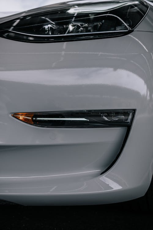 Close-Up Shot of a White Tesla Car