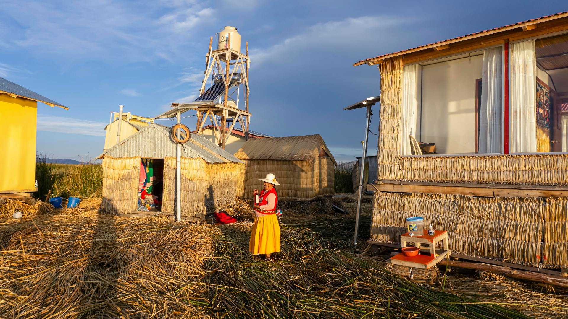 Peruvian Farmhouse and a Standing Woman