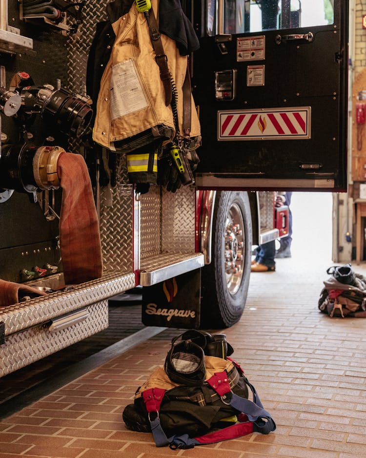 Bag Lying In Front Of Open Firetruck