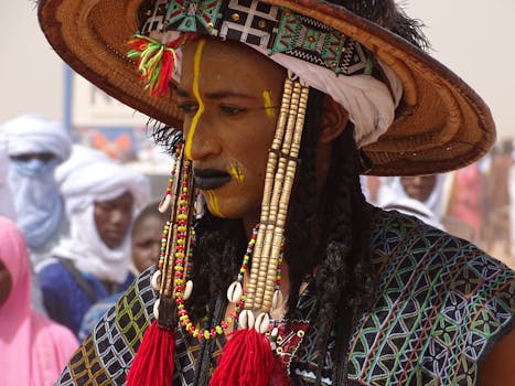 A man adorned in traditional Wodaabe attire during the Cure Salée festival in Niger.