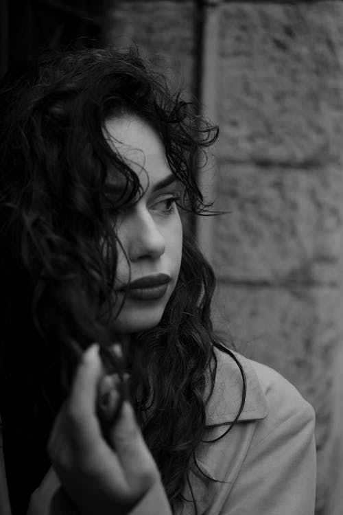 Grayscale Photo of Curly Hair Woman 