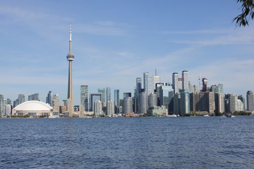 Free Stunning view of Toronto's skyline featuring the iconic CN Tower on a sunny day. Stock Photo