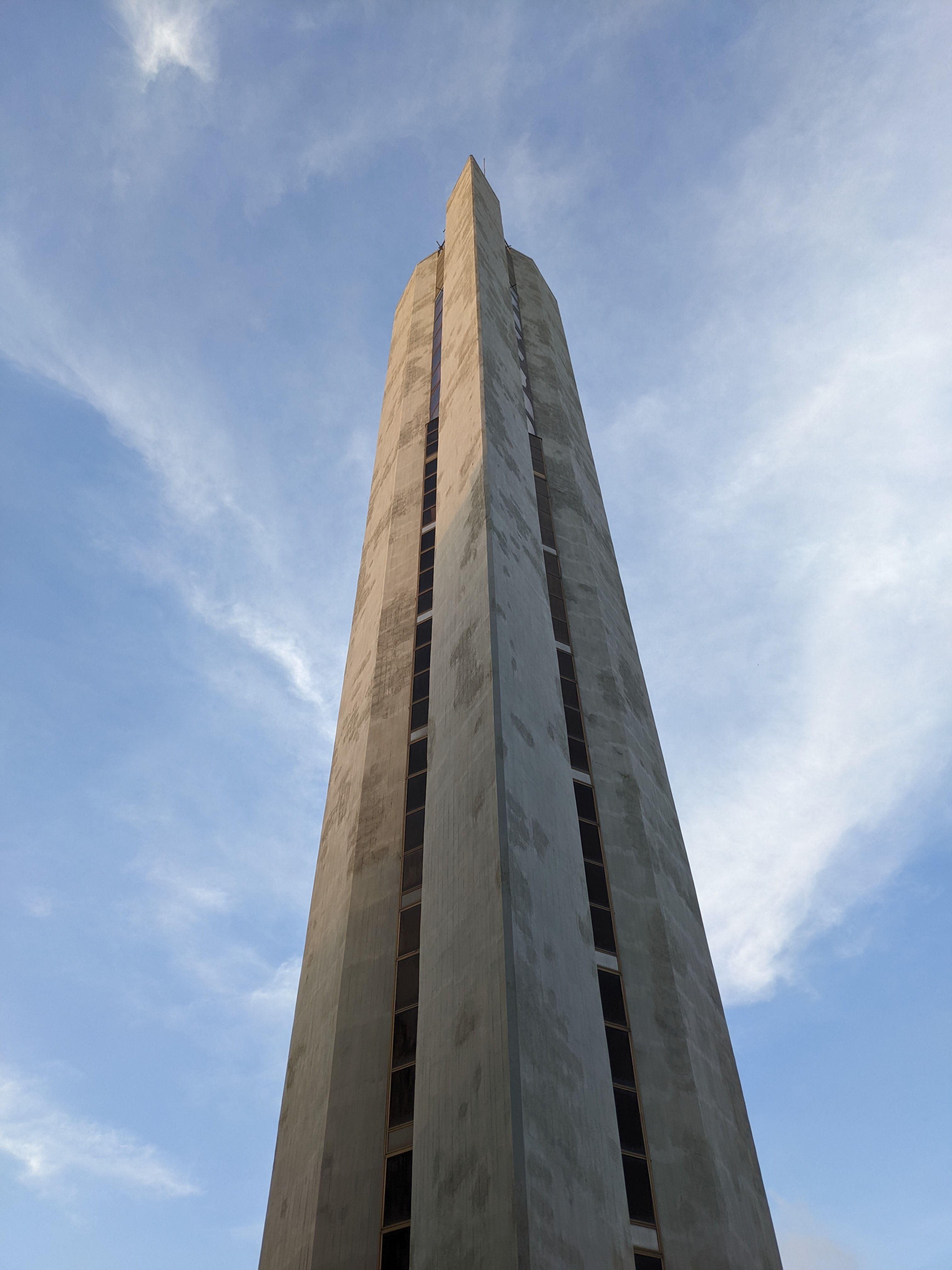 A Low Angle Shot of a Concrete Building Under the Blue Sky · Free Stock ...