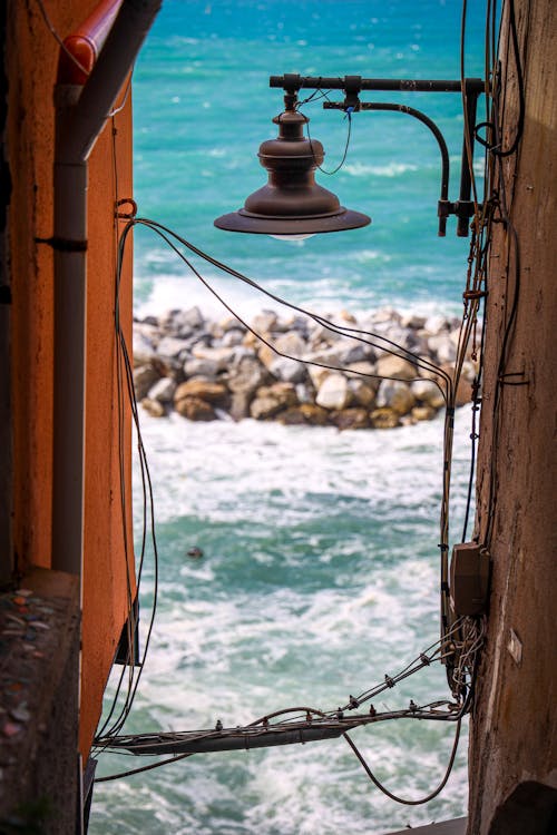 Lamp Hanging on House at Seashore