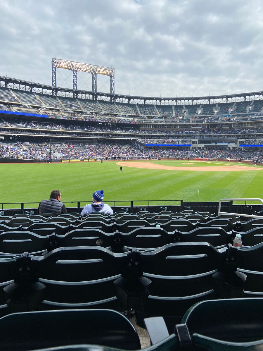 Rows of stadium seats looking out over the outfield