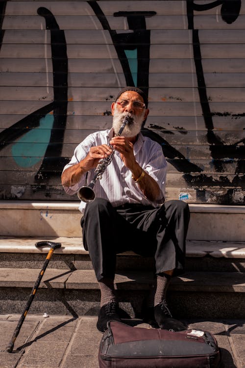 adam, dikey atış, gösteri içeren Ücretsiz stok fotoğraf