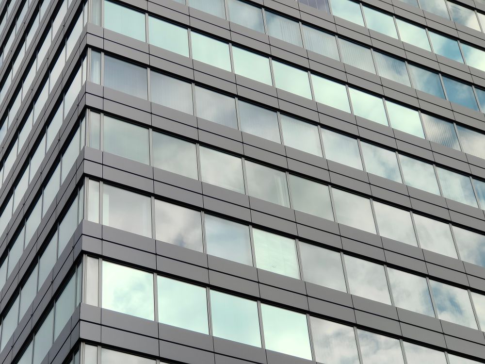 High Rise Building with Glass Windows · Free Stock Photo